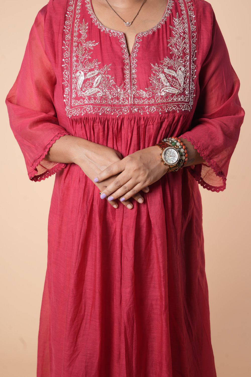 Pure Mulchanderi Maroon colour with silver Zari sequencing on yoke part