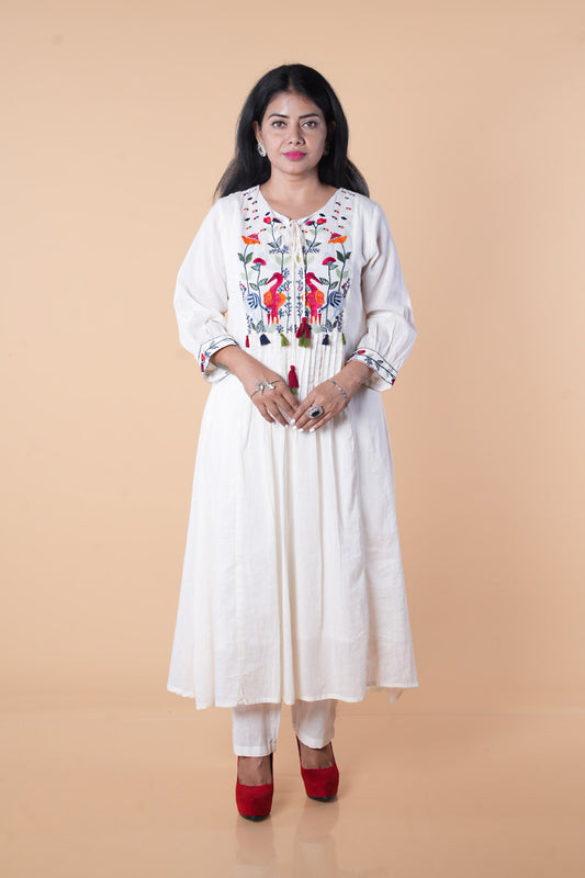 White mulcotton with crane embroidery work kurti pant