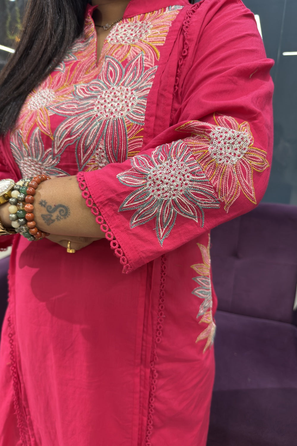 Pink Cotton Suit with suttle embroidery and pocktes on both the sides