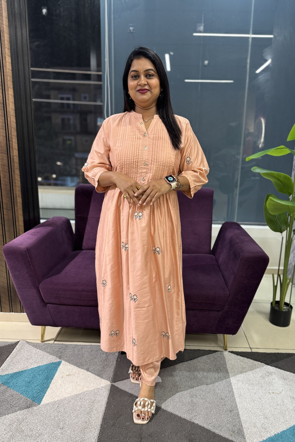 Peach colour pleated kurti with embroidery work