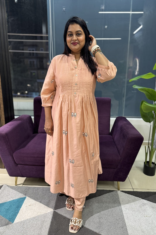 Peach colour pleated kurti with embroidery work