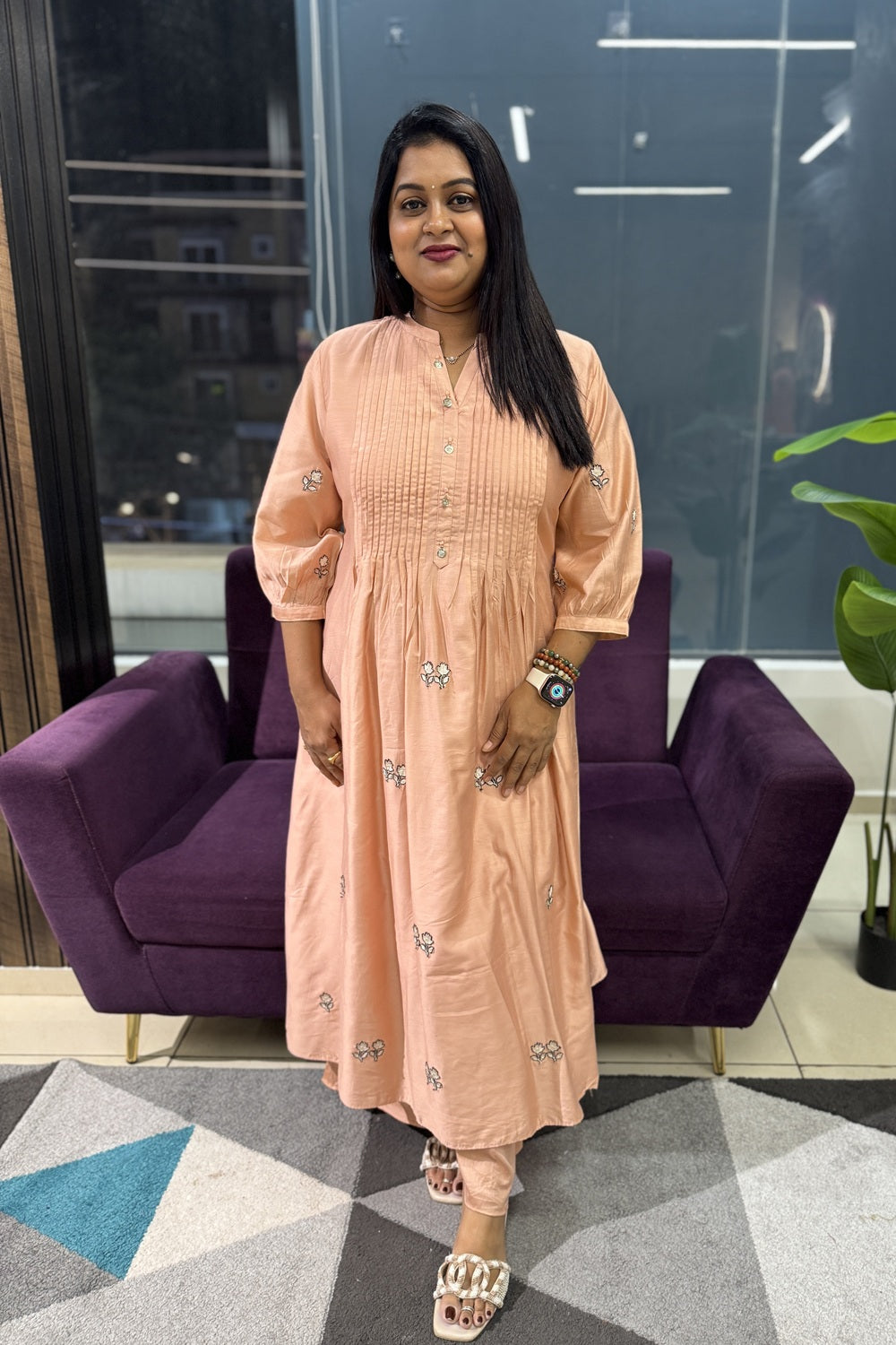 Peach colour pleated kurti with embroidery work